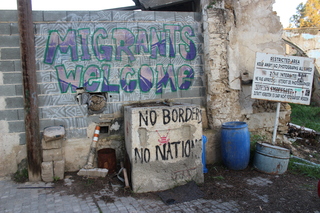 Migrants Welcome written on the wall in the divided capital, Nicosia